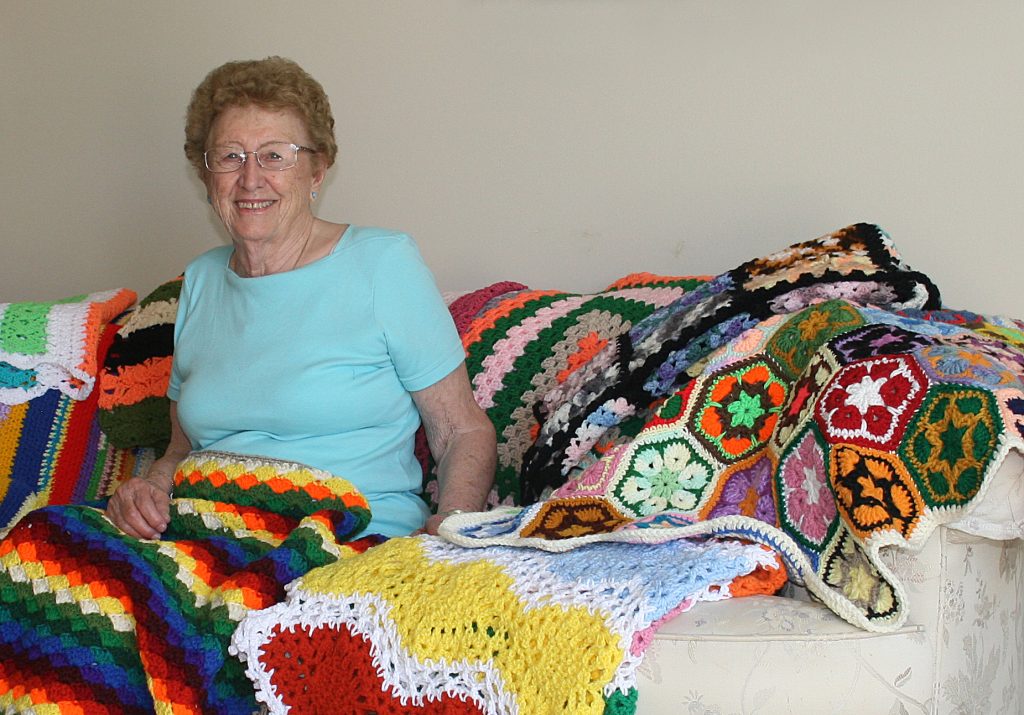 Joan with quilts