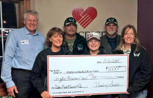 The Thundering Saints recently donated $8,000 to Hospice of the Red River Valley. Pictured: (back row) Curt Seter from Hospice of the Red River Valley, Larry Erickson, Rocky Gabel, (front row) Sue Peterson, Edie Johnson and Leah Fadness.