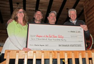 From left to right: Jen and Bill Beckman (pledge winners), event organizer Tom McArthur, and Hospice of the Red River Valley Development Officer Curt Seter