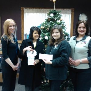 Border_State_Bank_present_gift_to_Hospice_L_R_Holly_Ennis__Jessica_Porter__Nicolle_Aukland_and_Bethany_Hunt