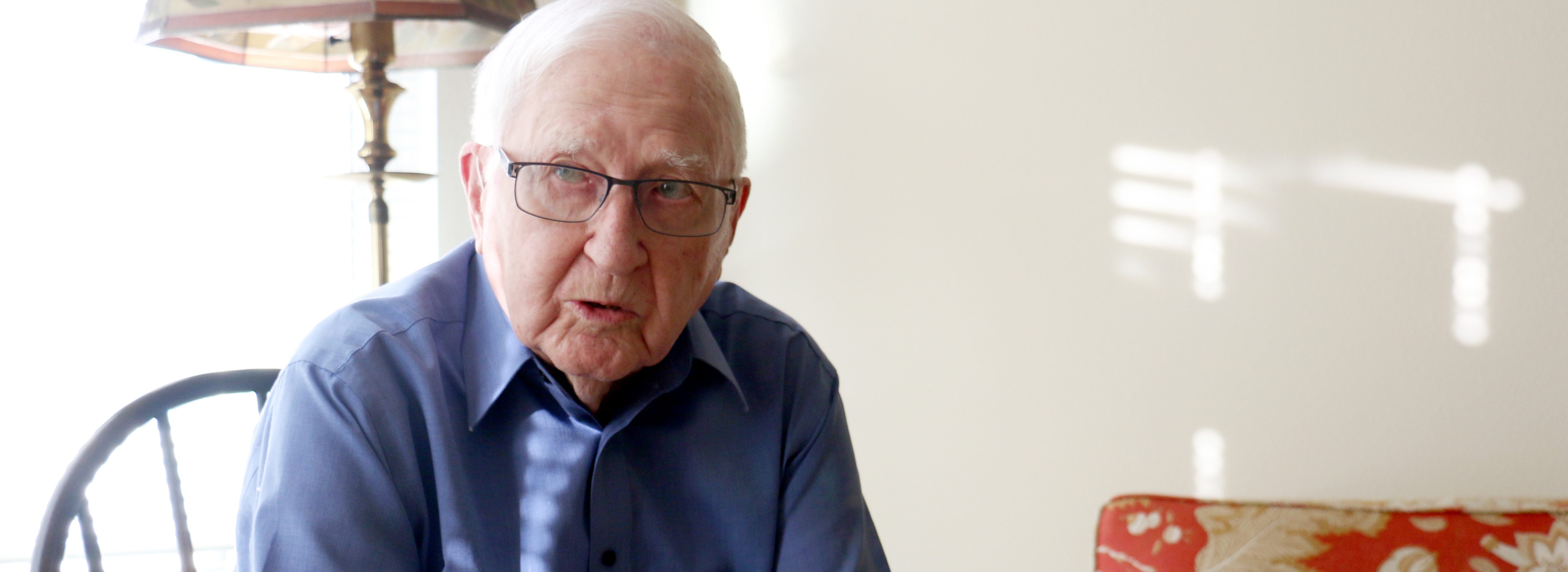 Senior man sitting in chair