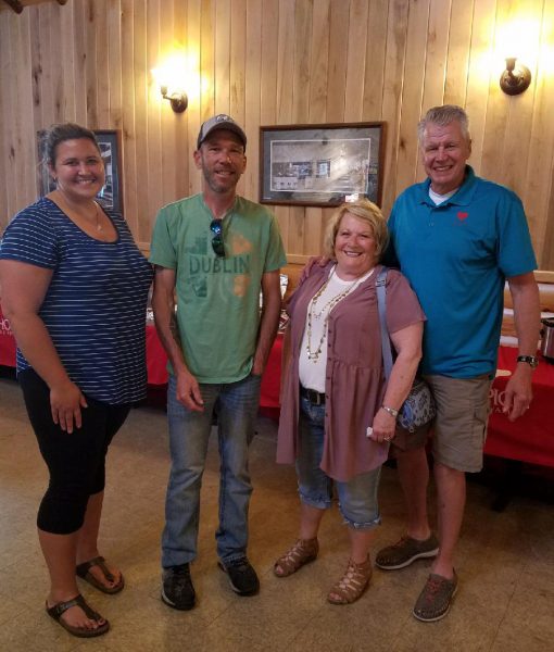 From left to right: Trish Baumann, Reed Bjerk, RibBest organizer Becky Rantanen and Curt Seter, development officer with Hospice of the Red River Valley.