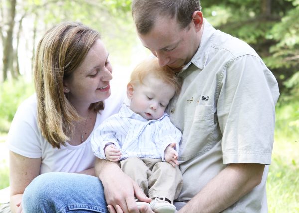 Brandi, Trent and Gauge Niemeier_Parents holding infant son