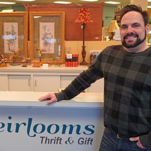 Steve Johnson_Heirlooms Assistant Manager_man standing next to retail counter
