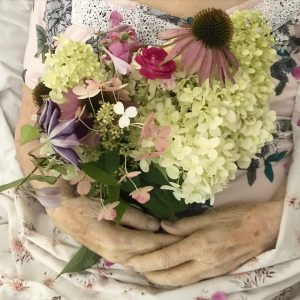 flowers in Grandma's hands