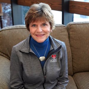 Sue Sorensen_woman sitting on couch