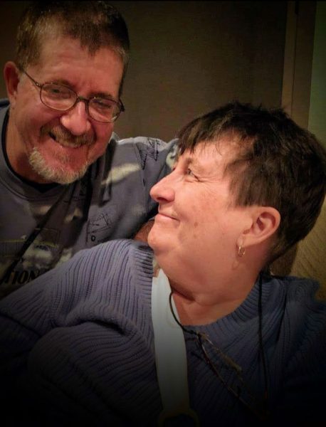 Lloyd and Linda Stoll smiling at one another.